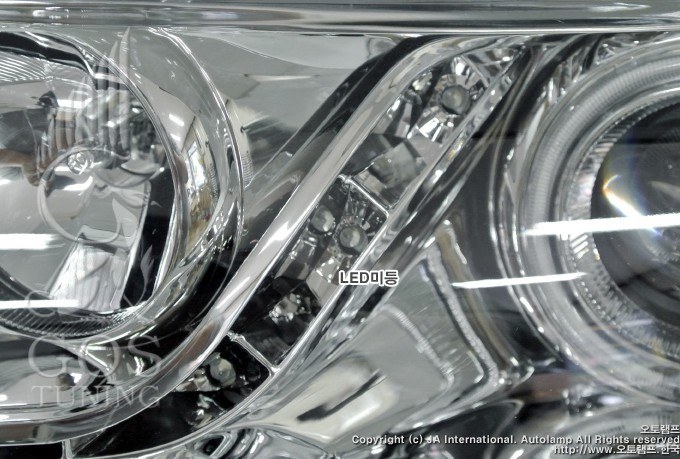 Передняя альтернативная оптика «Eagle Eyes Chrome» на Kia Cerato Forte / Kia Forte Koup