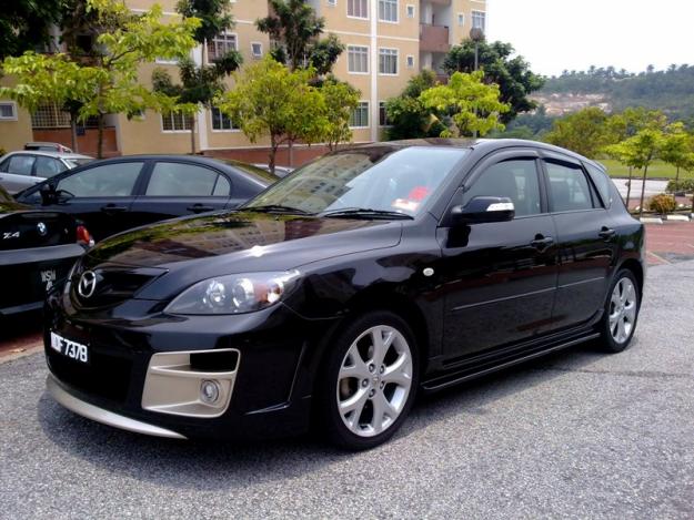 Передний бампер «Auto Exe» для Mazda 3 Hatchback