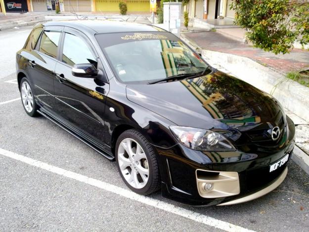 Передний бампер «Auto Exe» для Mazda 3 Hatchback
